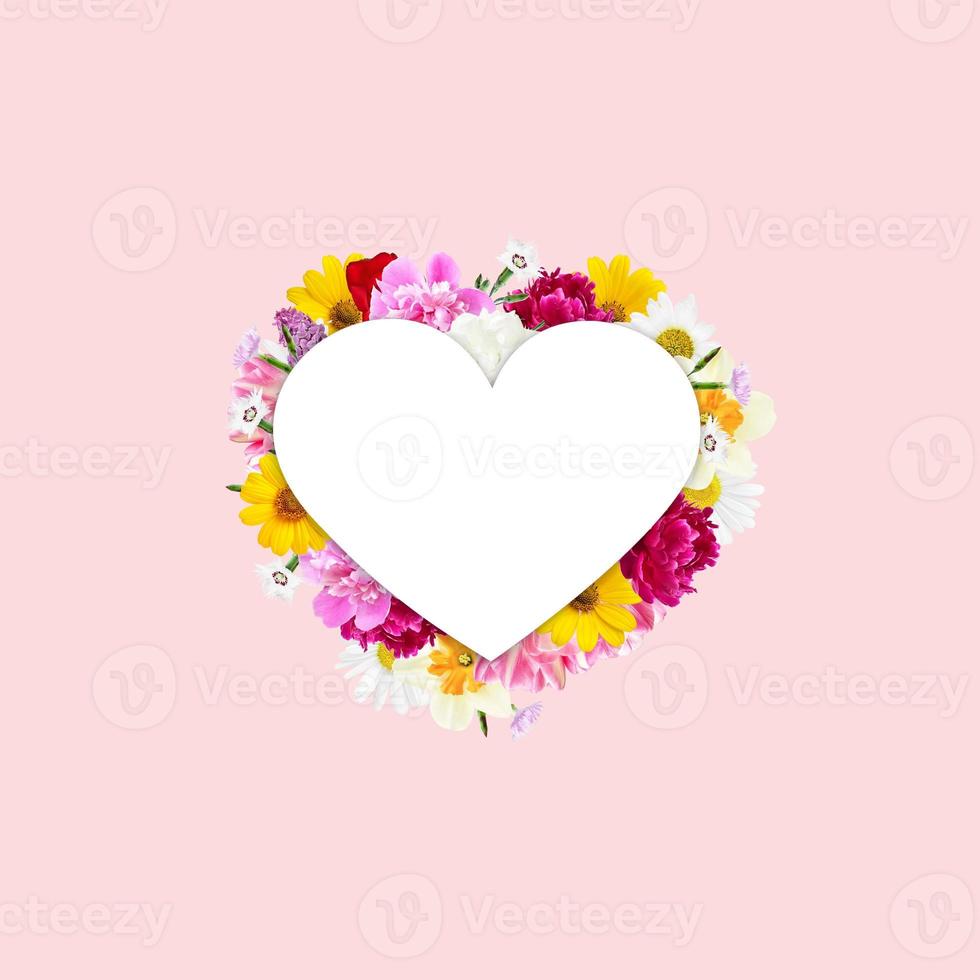 Heart with flowers on a pink background. Valentine's Day. Mothers Day. photo