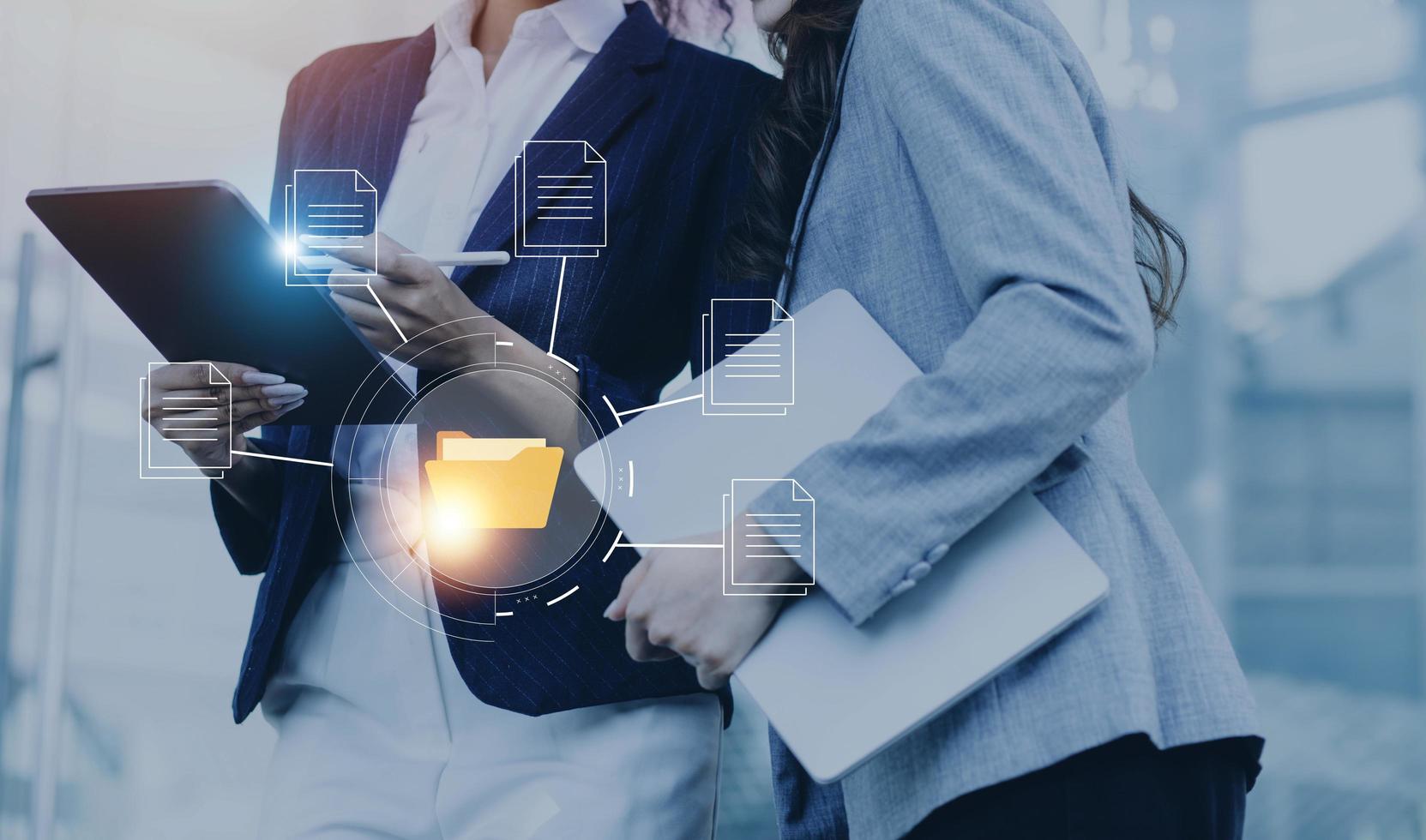Document management system concept, business man holding folder and document icon software, searching and managing files online document database, for efficient archiving and company data. photo