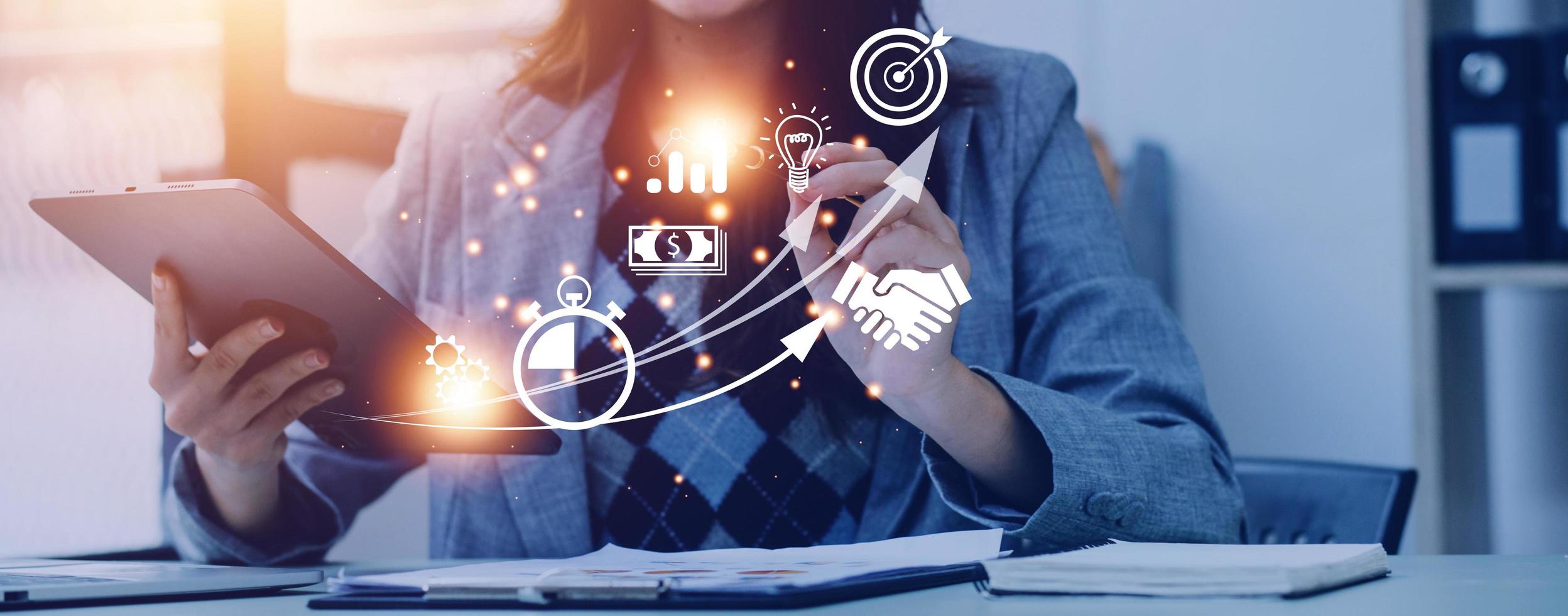 Startup concept with icon business and network connection on modern virtual interface from digital tablet. man touching on tablet. online business, e-comers, online marketing photo
