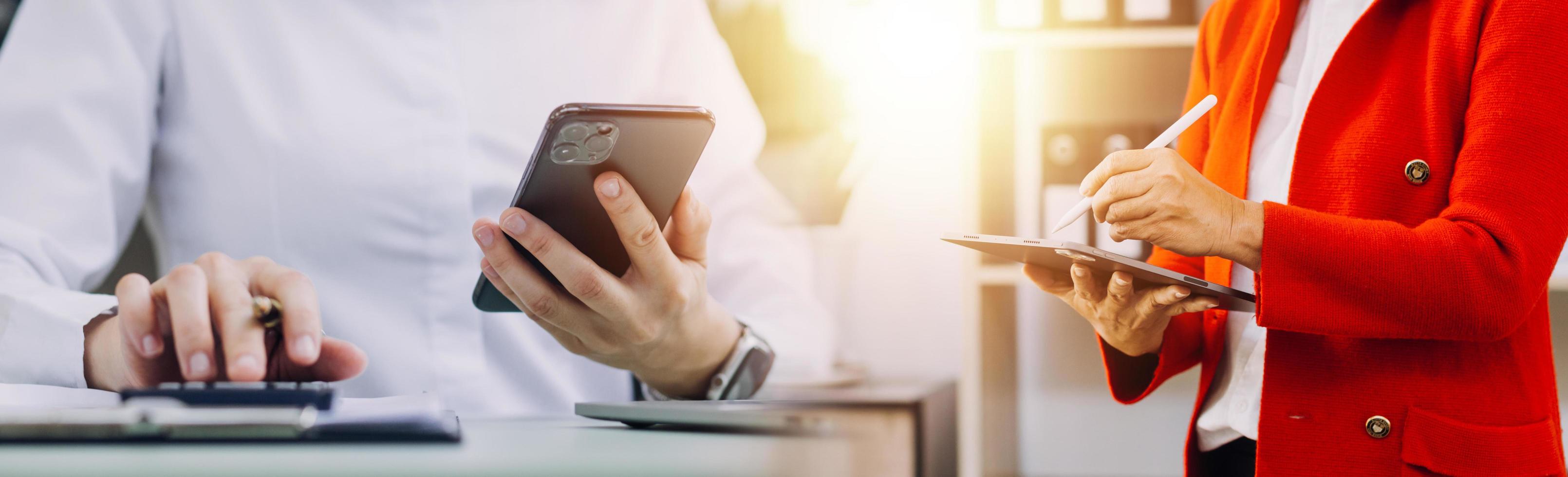 casual businessman Working using mobile phone typing computer mobile chat laptop contact us at workplaces, planning ideas investors internet searching, ideas connecting people. photo