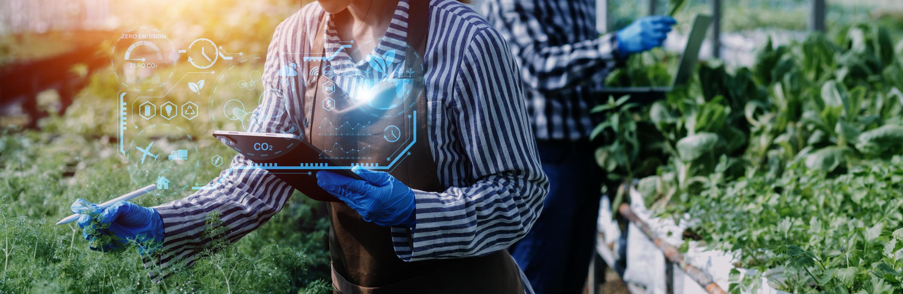 Selective focus. Architect team planning design apply renewable or solar energy on architectural building model with virtual reality technology hologram. Alternative green energy in future concept. photo