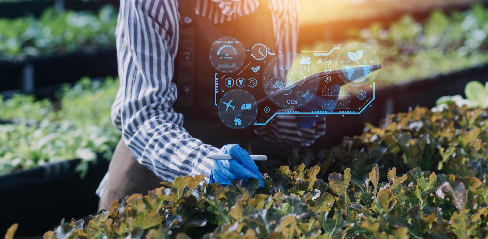 Selective focus. Architect team planning design apply renewable or solar energy on architectural building model with virtual reality technology hologram. Alternative green energy in future concept. photo
