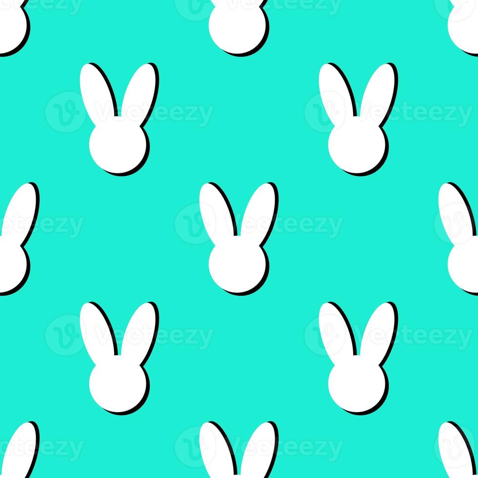 Seamless pattern with white rabbit heads photo
