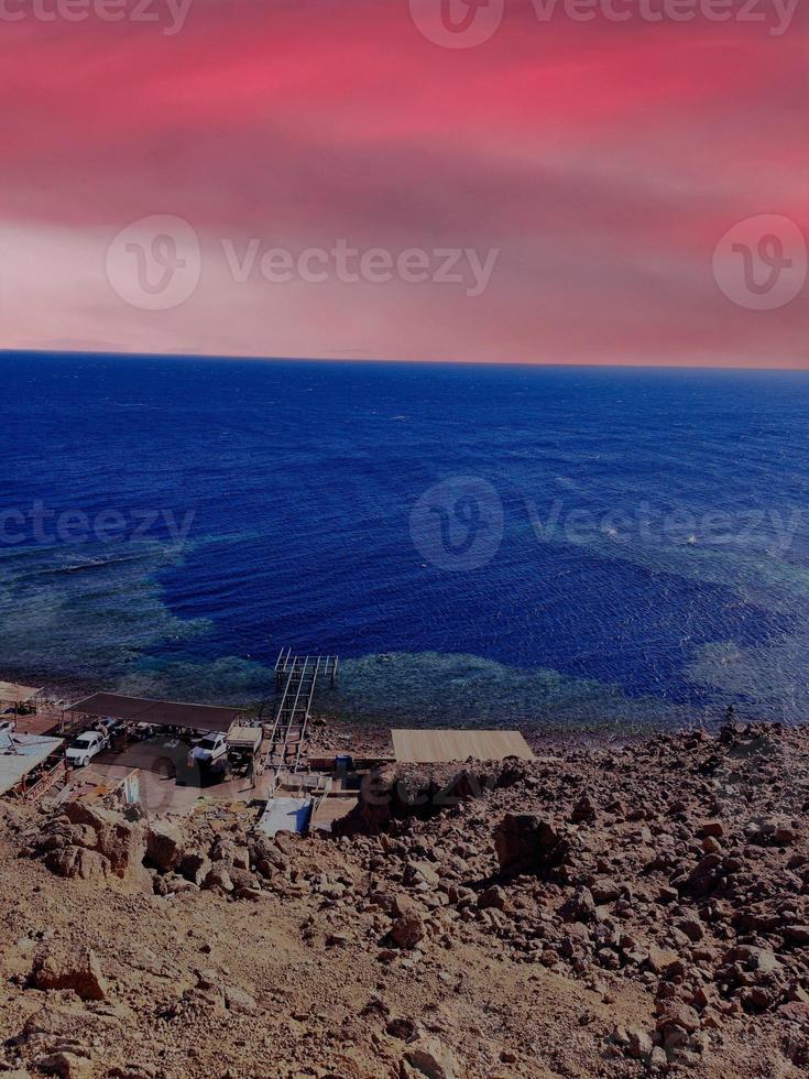 Scenic view of ocean view and mountains at sunset in Sinai, Egypt photo