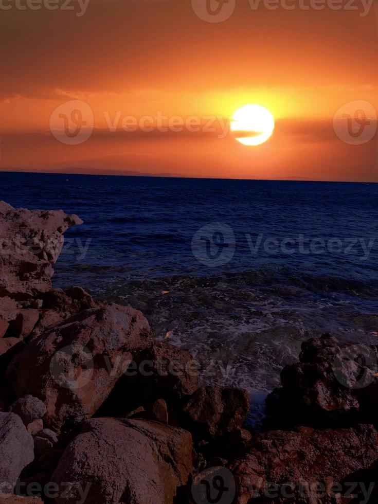 Scenic view of ocean view and mountains at sunset in Sinai, Egypt photo