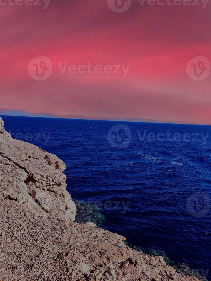Scenic view of ocean view and mountains at sunset in Sinai, Egypt photo