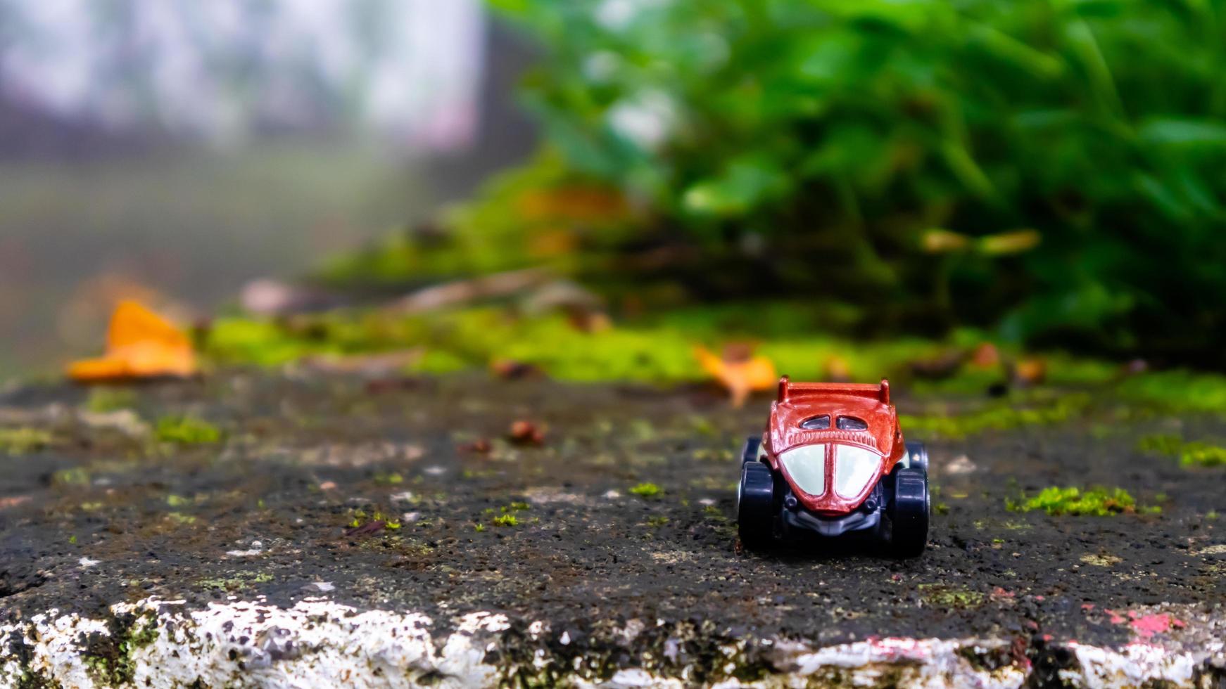 Minahasa, Indonesia  December 2022, the toy car in nature photo