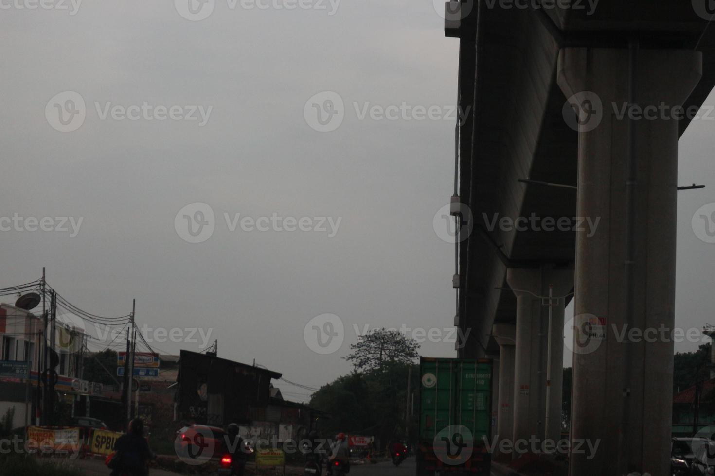 Close up photo of a back lamp of car that stuck in a traffic jam on the highway,