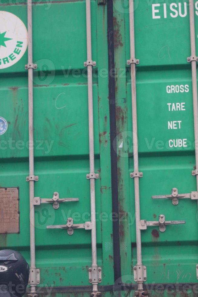 Back view of the container in green. photo