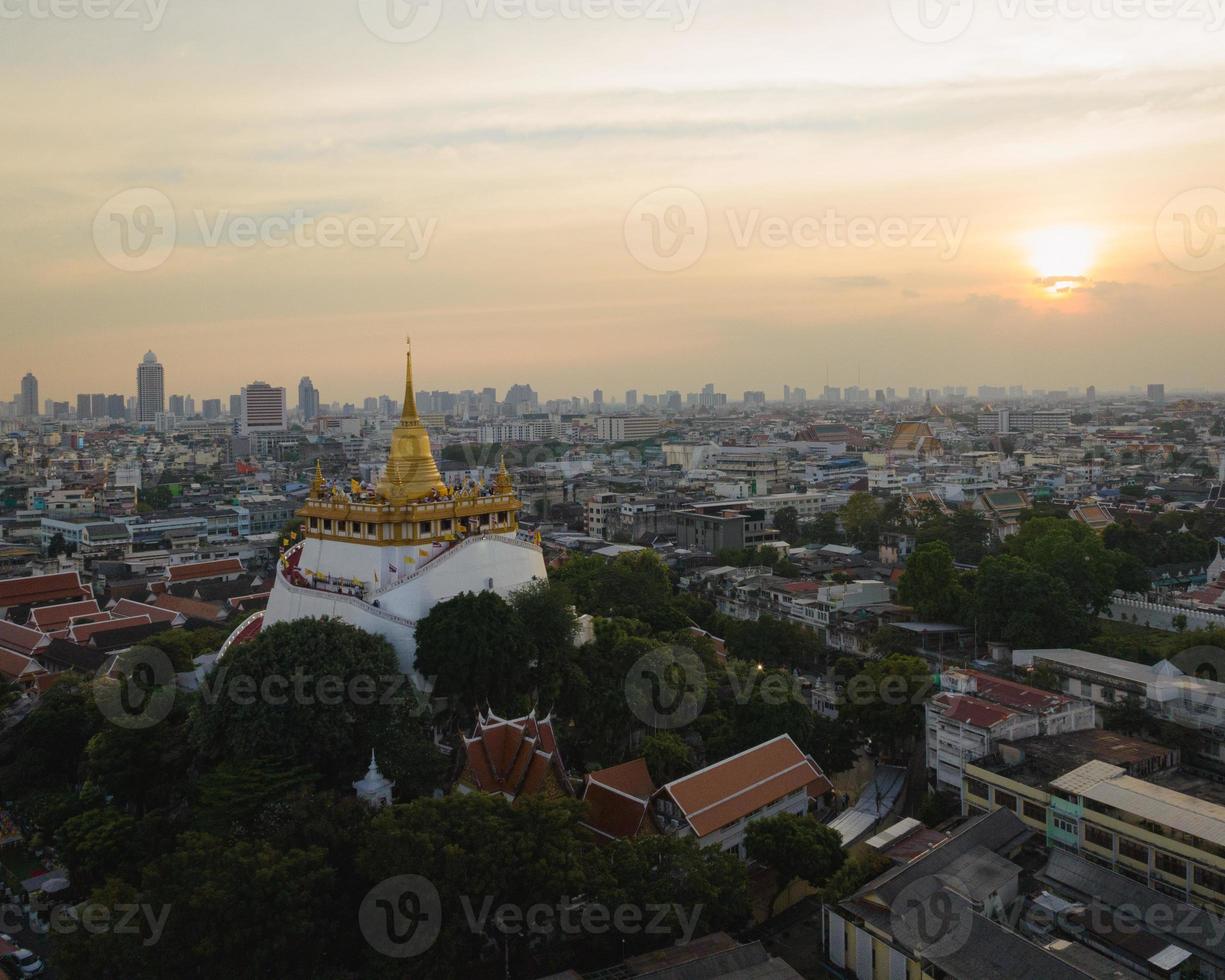 An aerial view of the Golden Mount stands prominently at Saket Temple, The most famous tourist attraction in Bangkok, Thailand photo