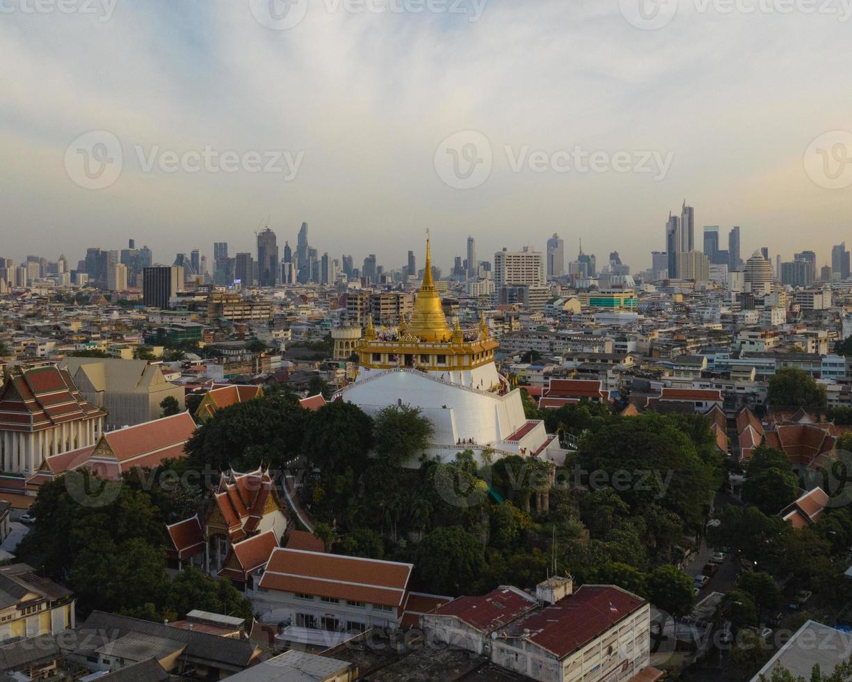 An aerial view of the Golden Mount stands prominently at Saket Temple, The most famous tourist attraction in Bangkok, Thailand photo
