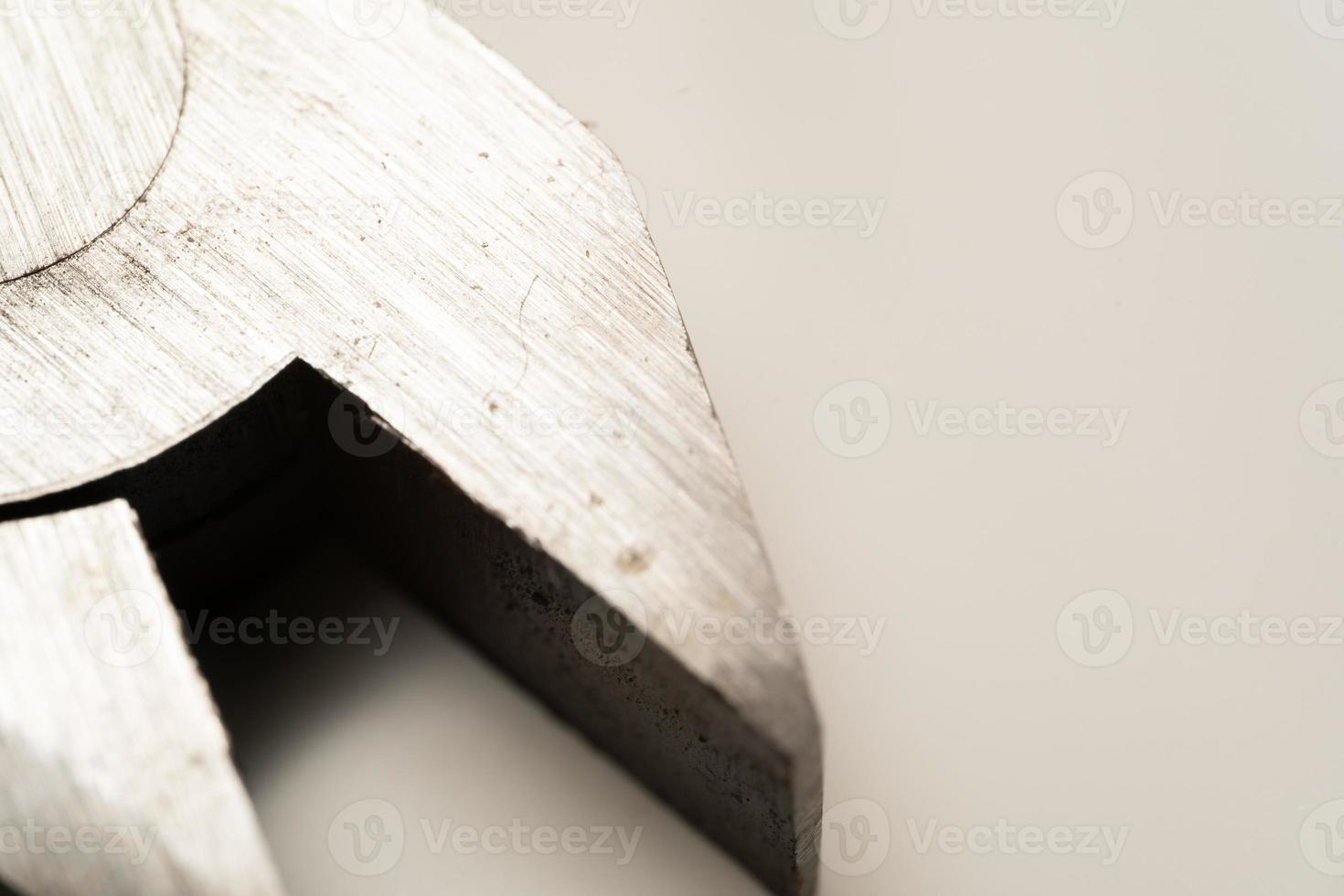 Close up pliers in white background. Selective focus. photo