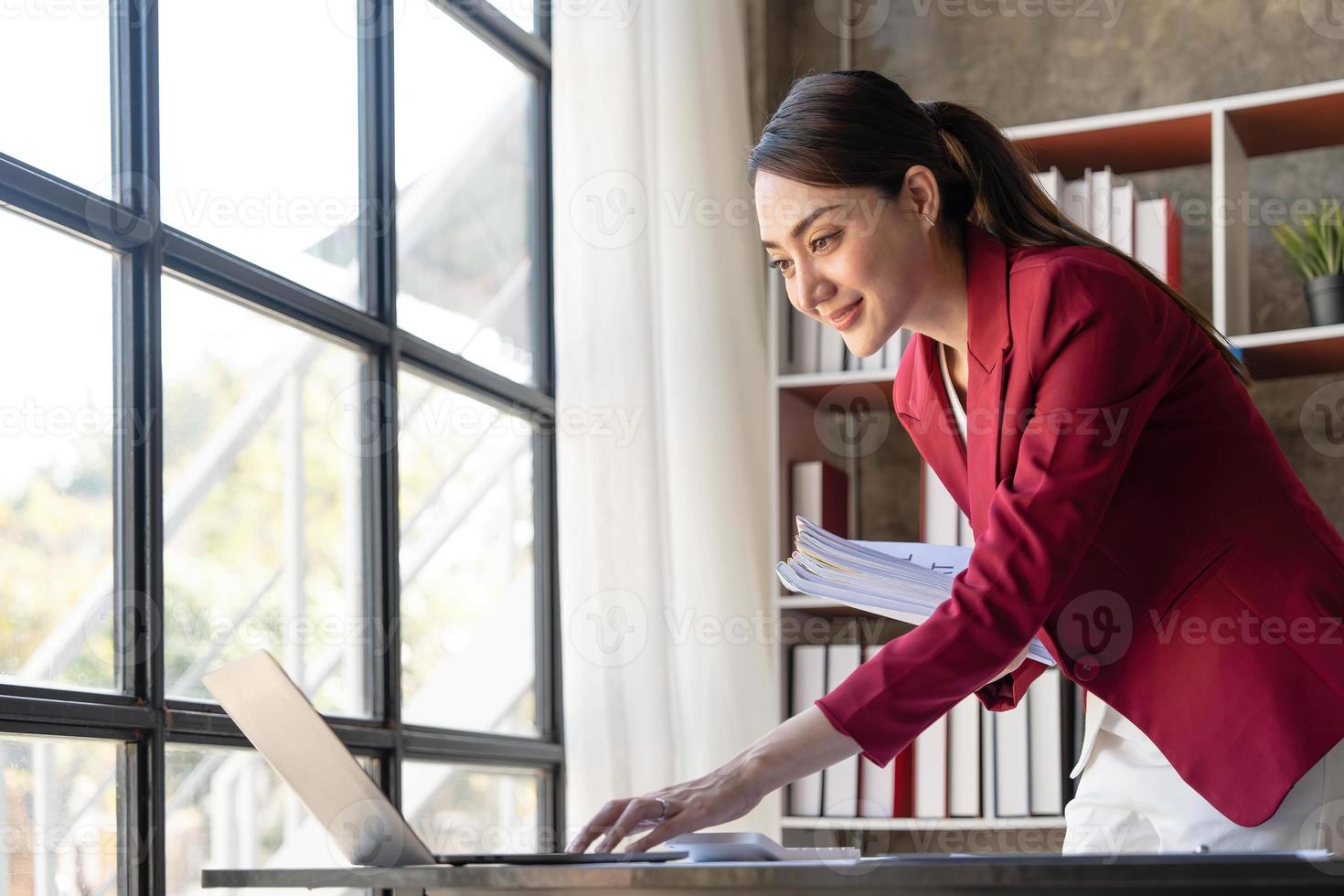 Business Documents, Auditor businesswoman checking searching document legal prepare paperwork or report for analysis TAX time,accountant Documents data contract partner deal in workplace office photo