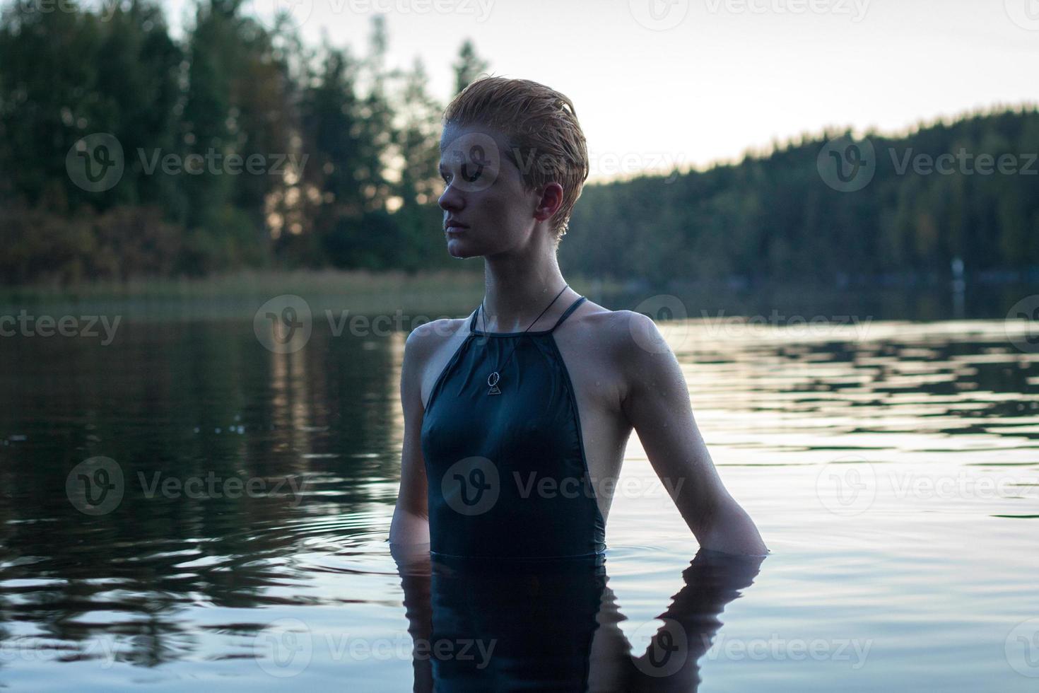 Close up short haired model in river at sunset portrait picture photo