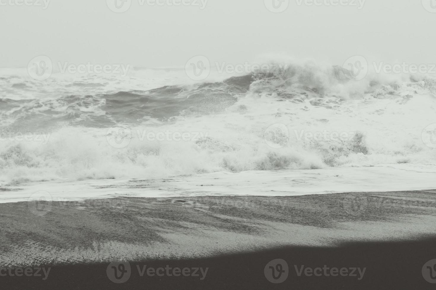 Heavy storm on sea beach monochrome landscape photo