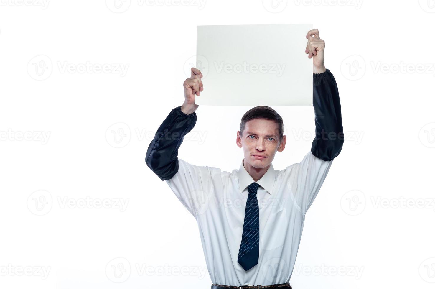 Business man with a piece of paper in his hands on a white, isolated background photo