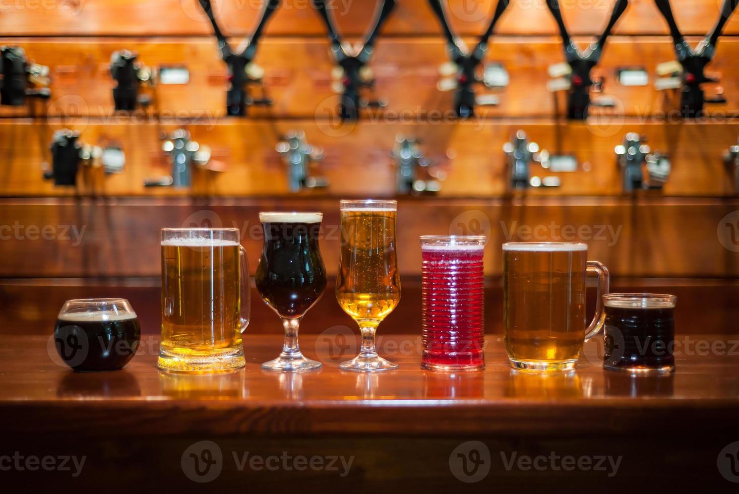 Different varieties of pees are on the bar in the pub photo