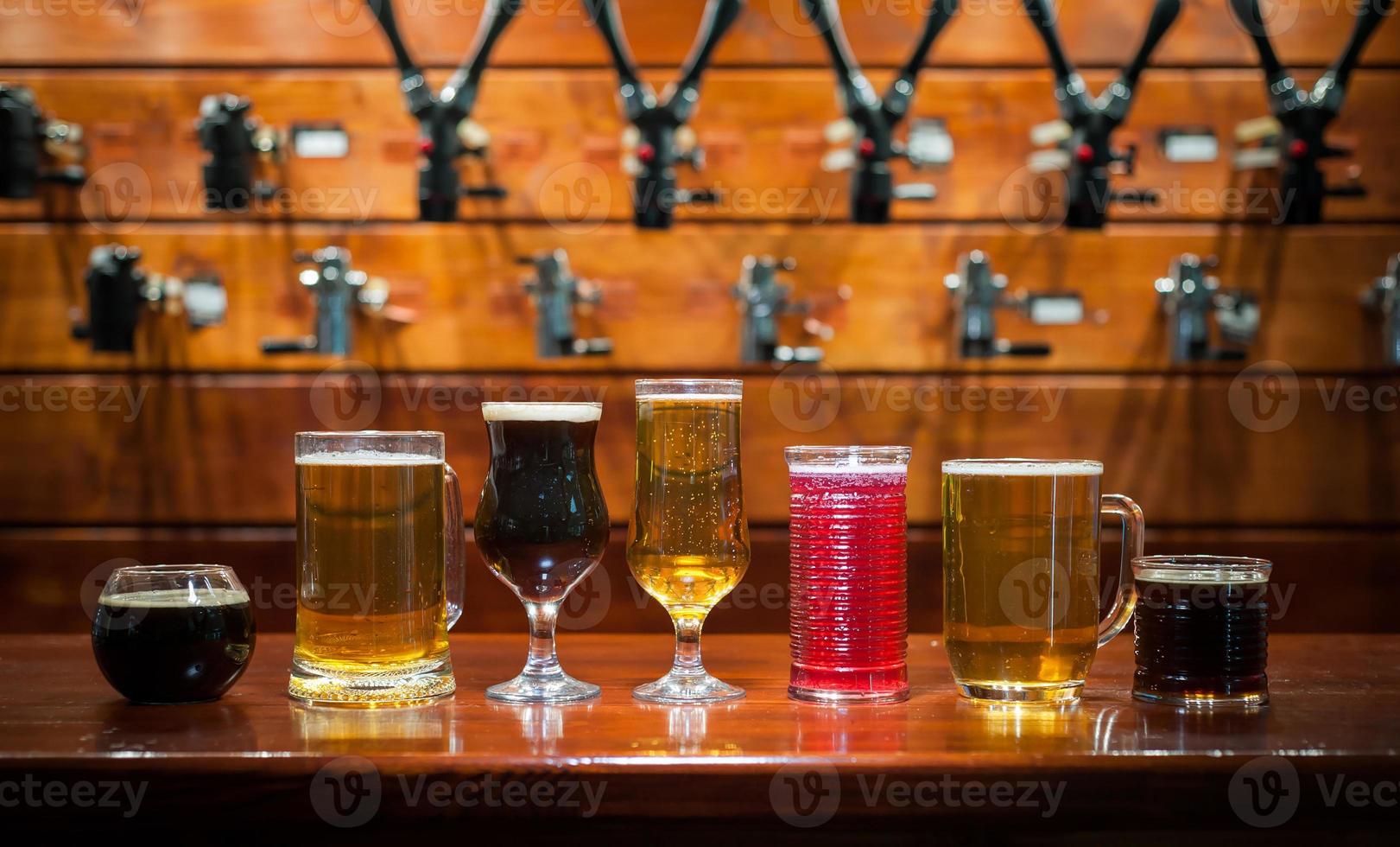 Different varieties of pees are on the bar in the pub photo