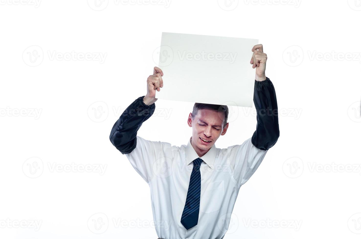 Business man with a piece of paper in his hands on a white, isolated background photo