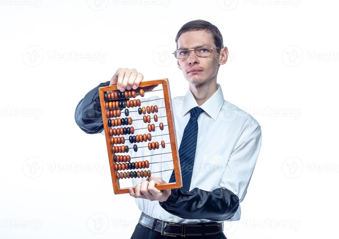 Business man in tie and glasses with bills in hand on white, isolated background photo