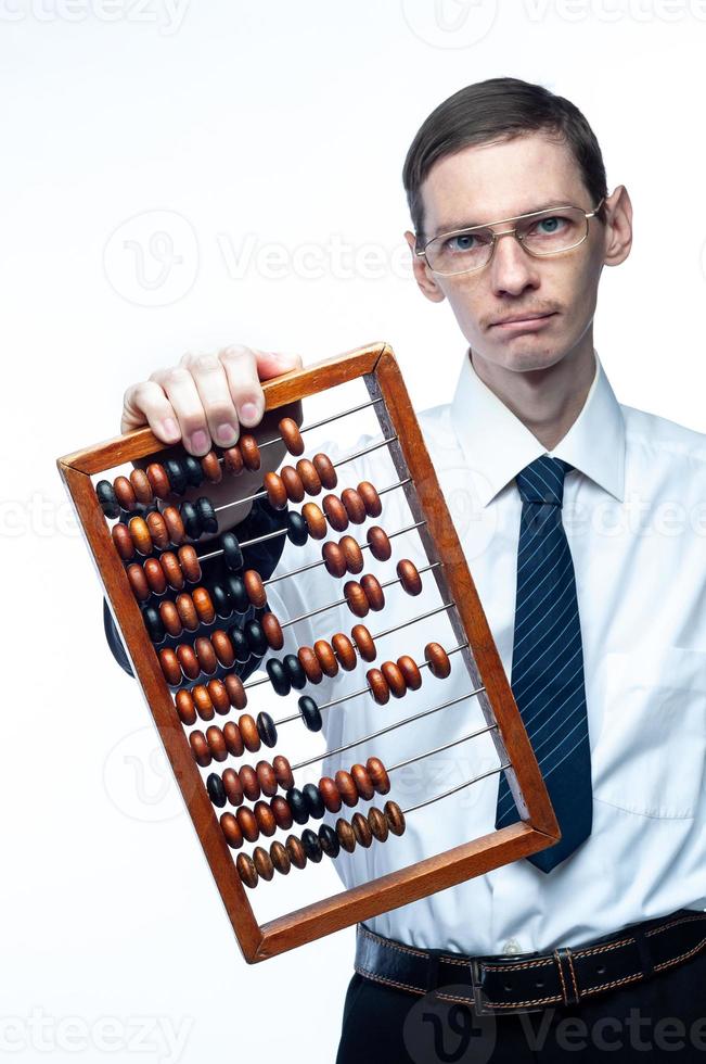 Business man in tie and glasses with bills in hand on white, isolated background photo