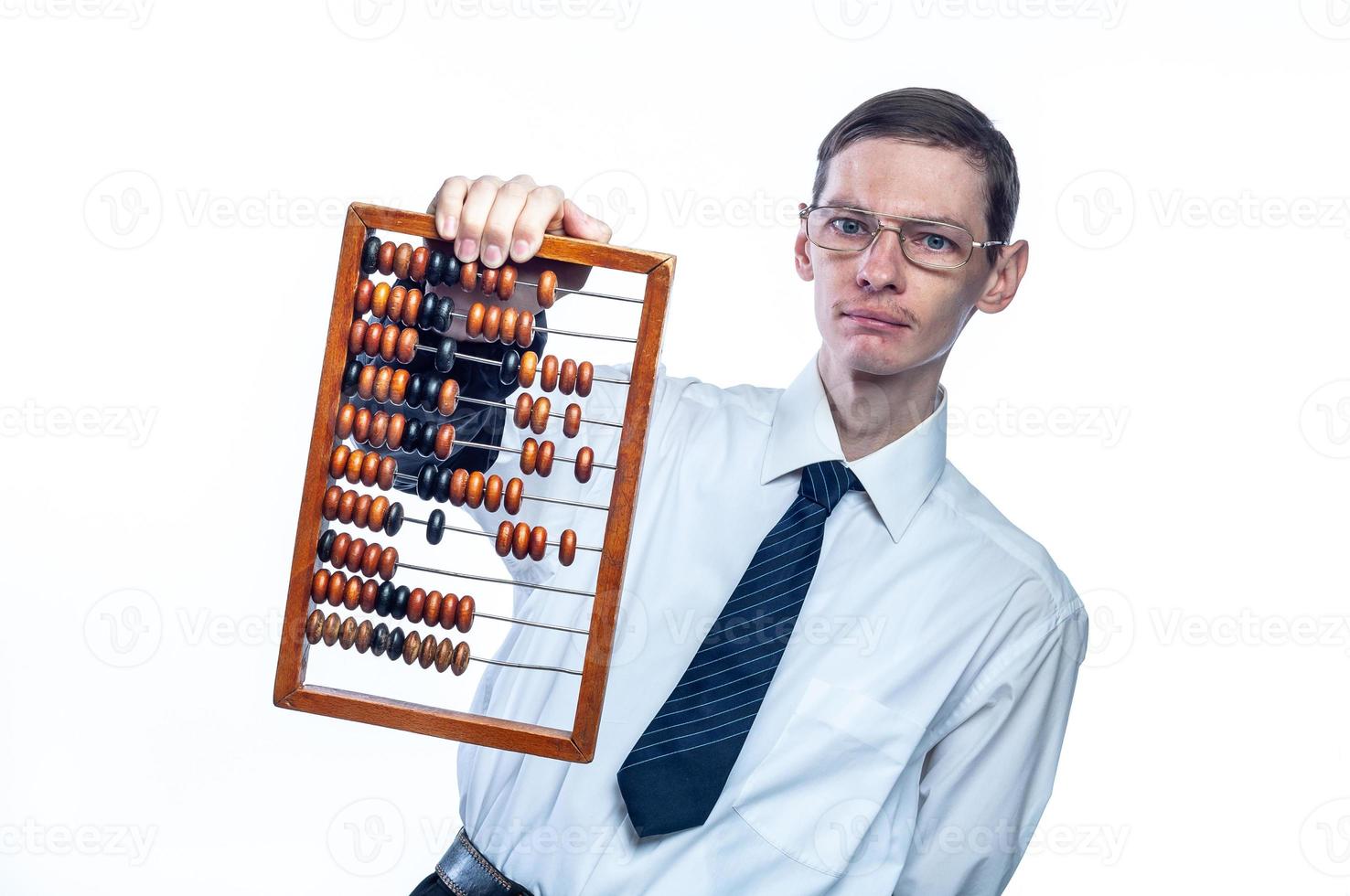 Business man in tie and glasses with bills in hand on white, isolated background photo