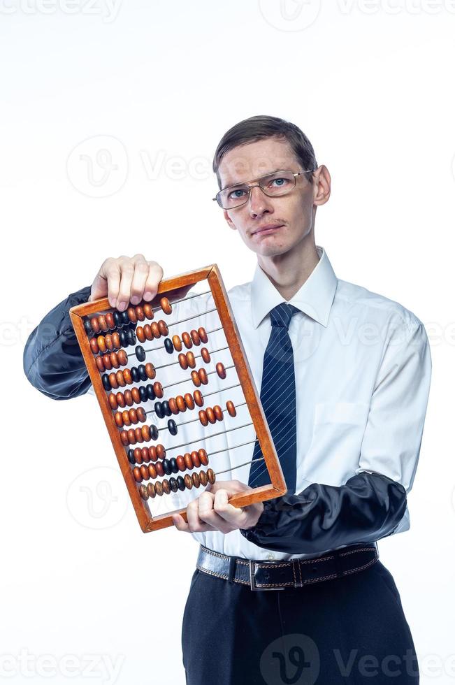 Business man in tie and glasses with bills in hand on white, isolated background photo