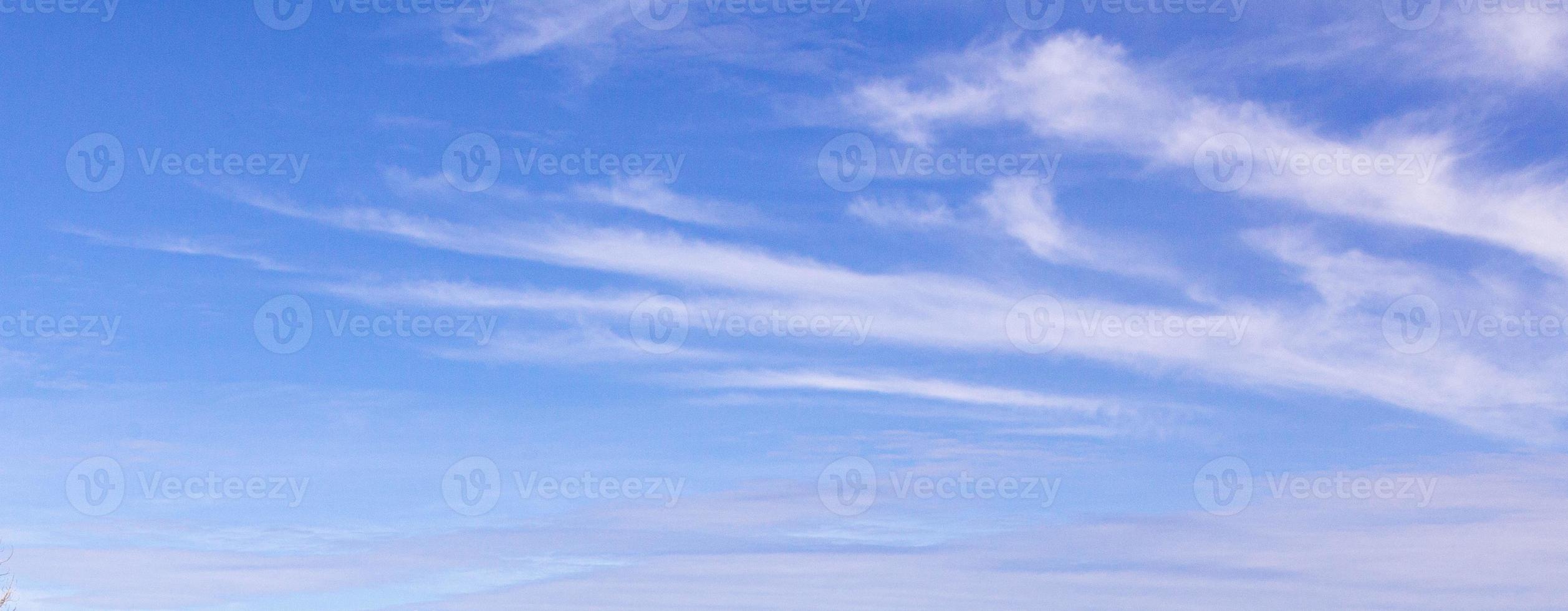 Image of a partly cloudy and partly clear sky during the day photo