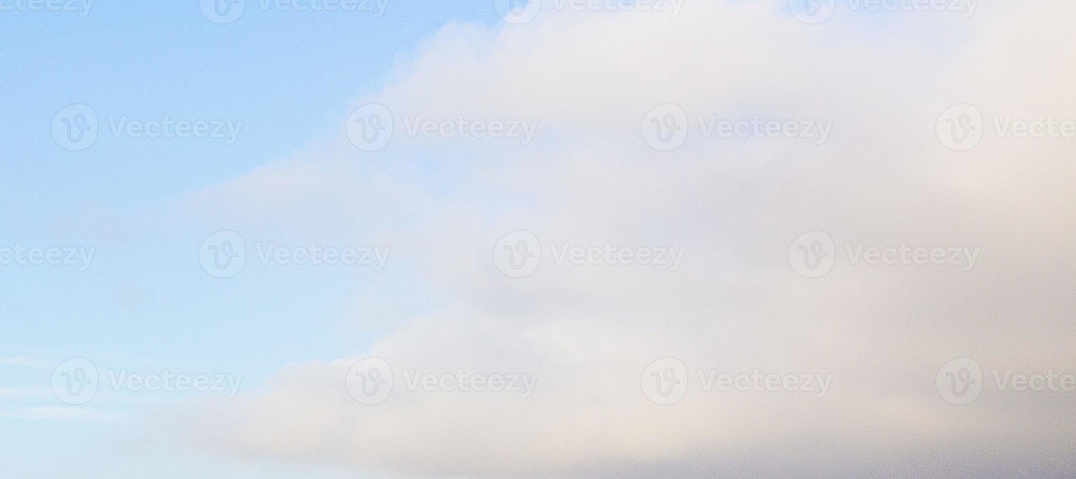 Image of a partly cloudy and partly clear sky during the day photo