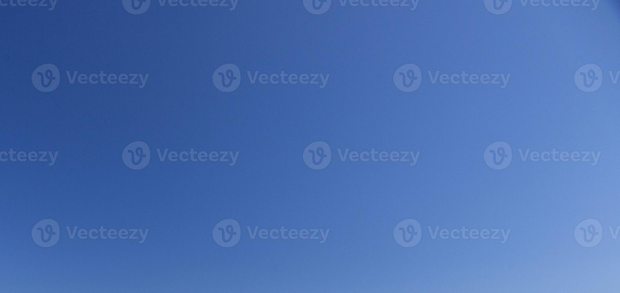 Image of a clear and cloudless sky can be used as background photo