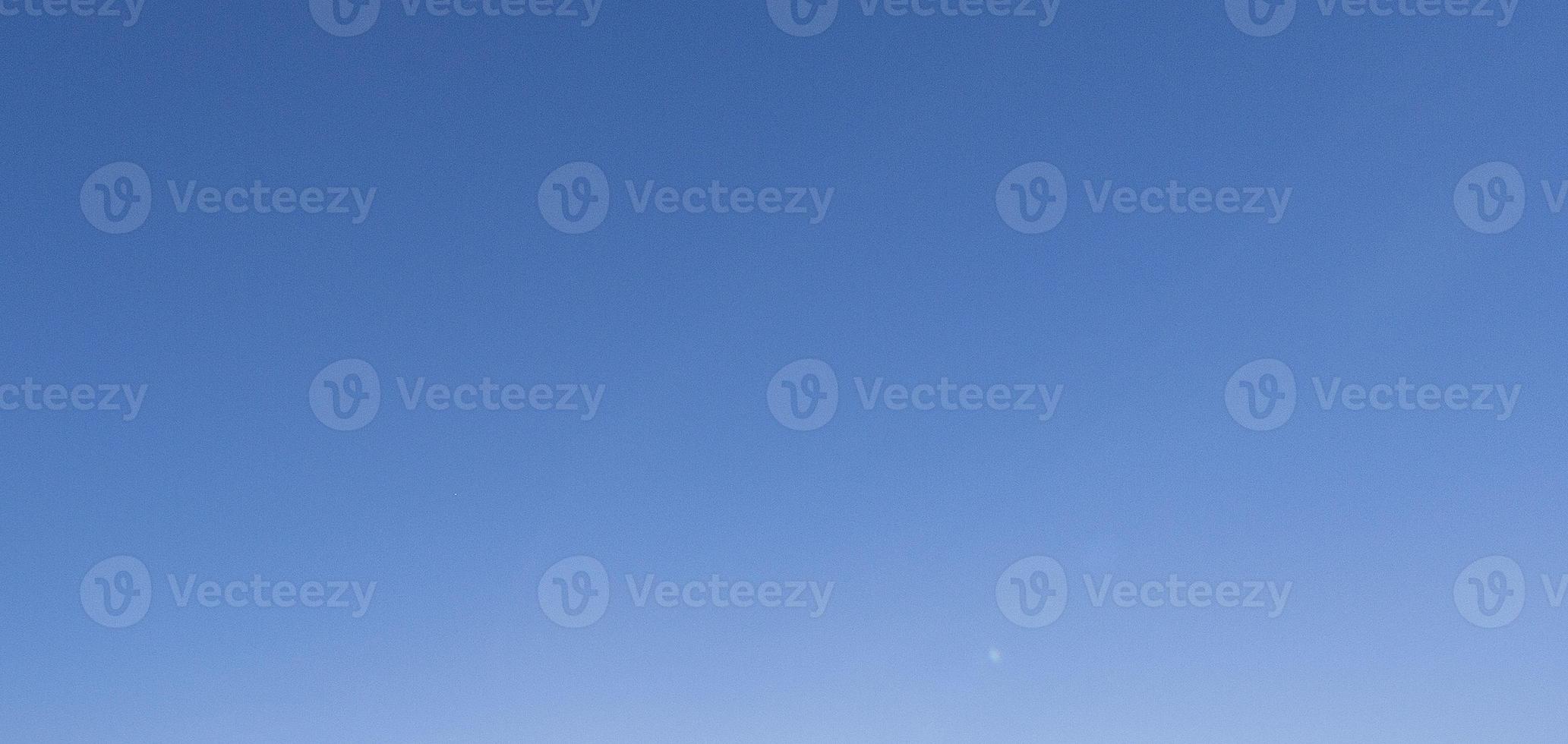 Image of a clear and cloudless sky can be used as background photo