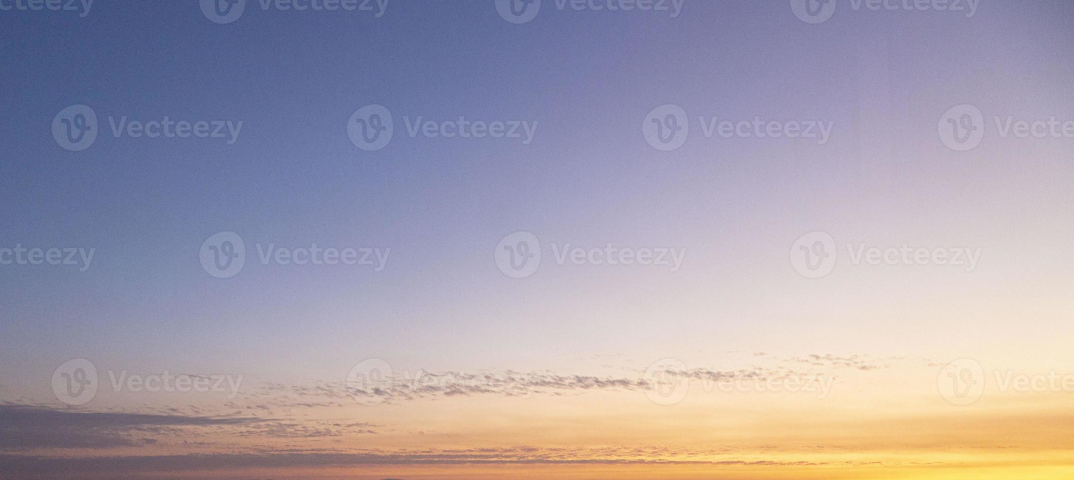 Dramatic colorful sky with afterglow and illuminated clouds photo