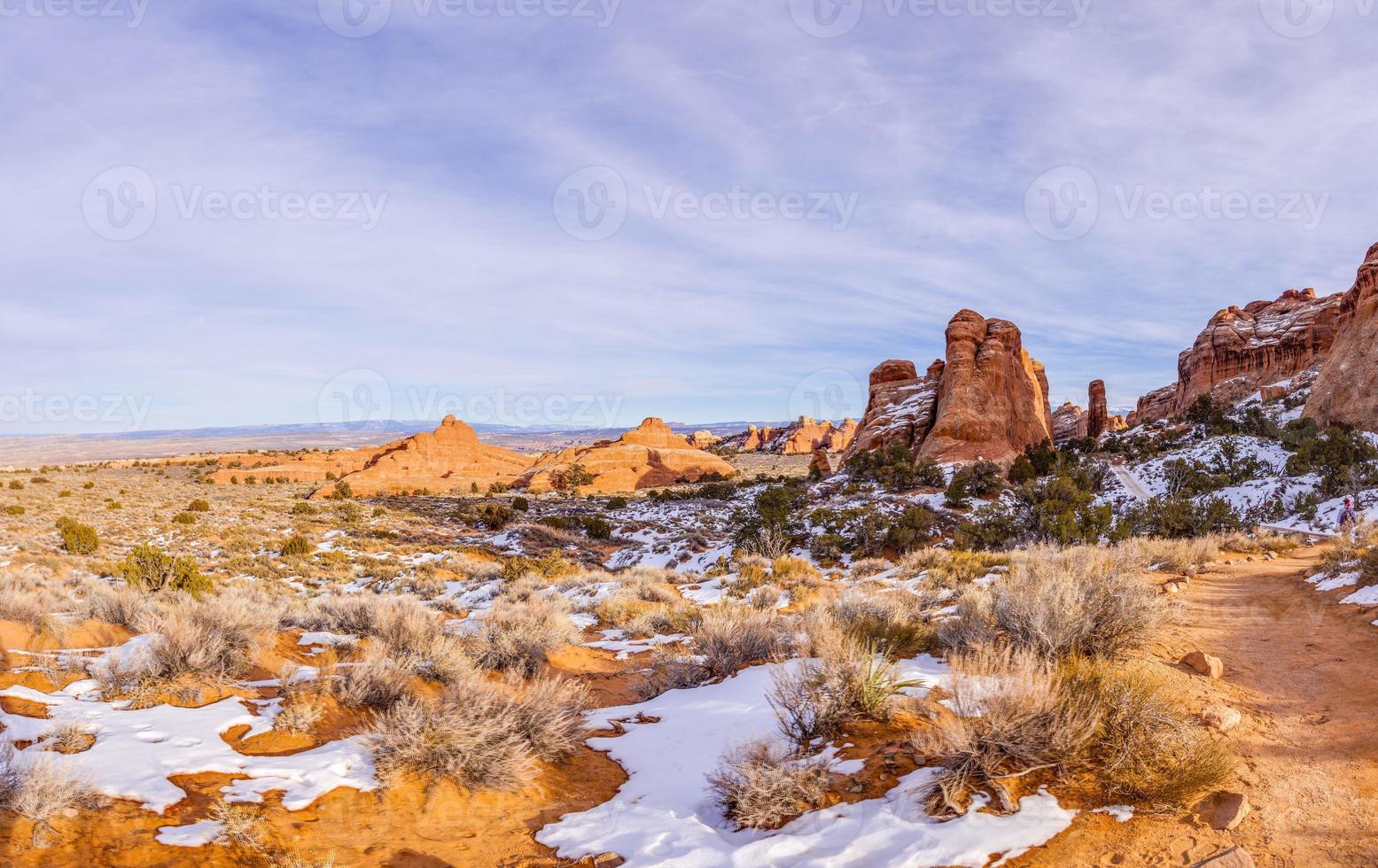 Panoramic picture of natural and geological wonders of Arches national park in Utah in winter photo