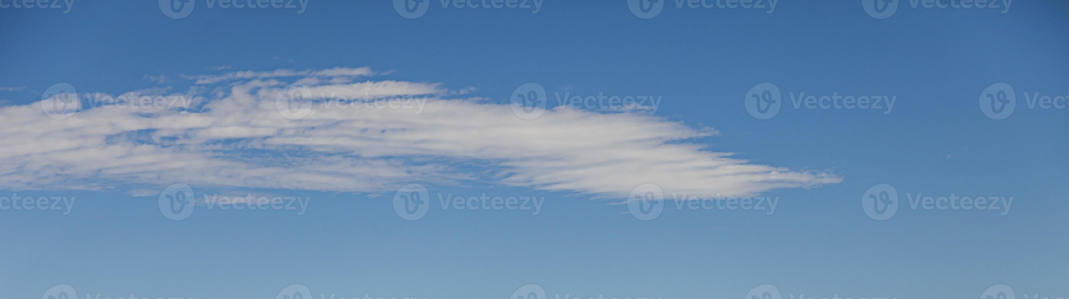 Image of a partly cloudy and partly clear sky during the day photo