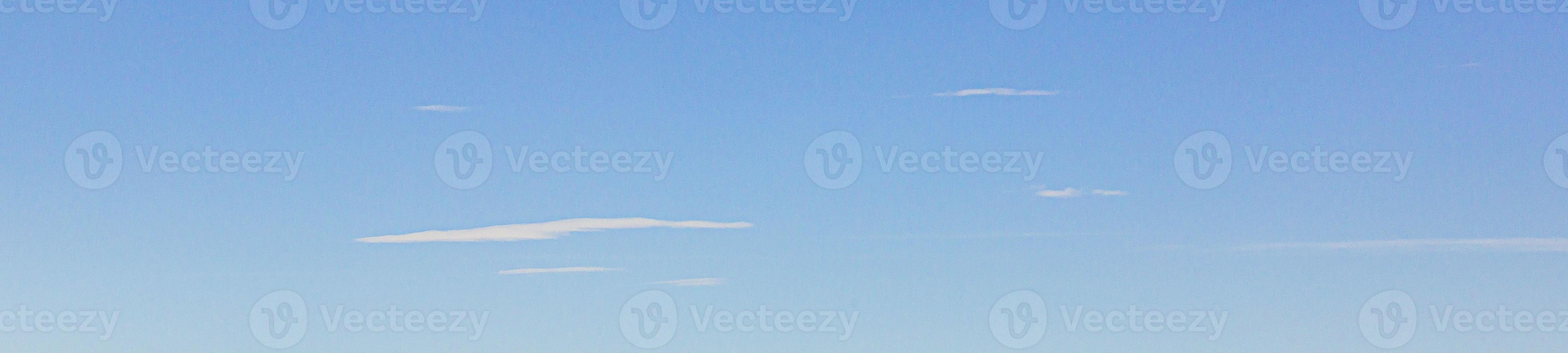 Image of a partly cloudy and partly clear sky during the day photo