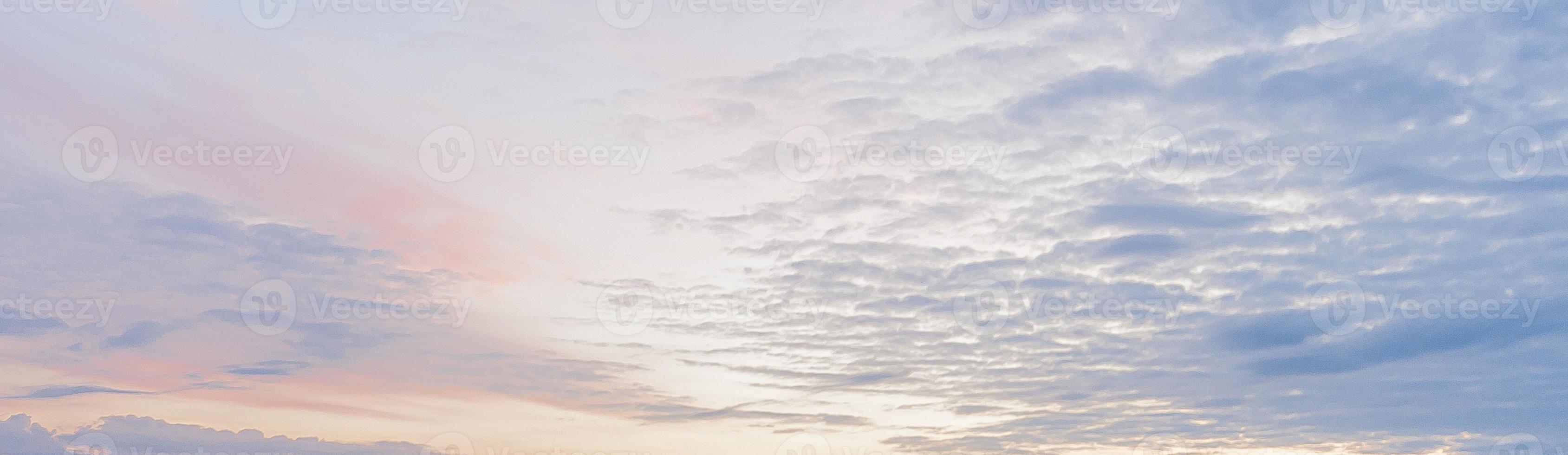 Dramatic colorful sky with afterglow and illuminated clouds photo