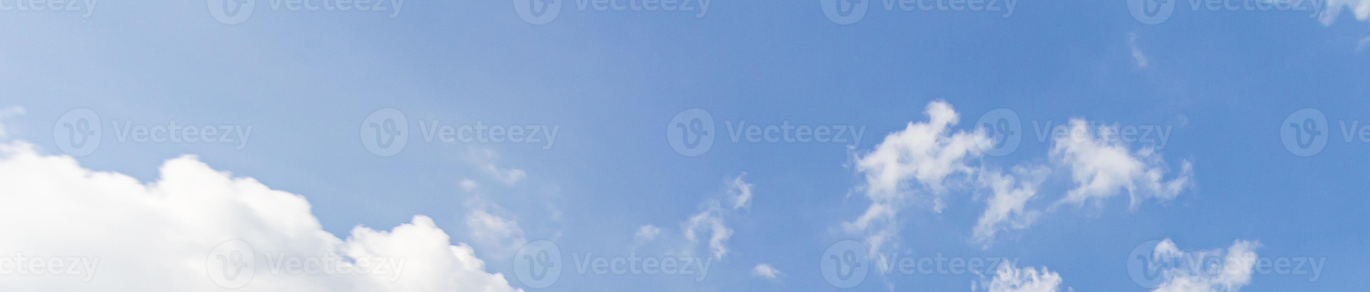 Image of a partly cloudy and partly clear sky during the day photo