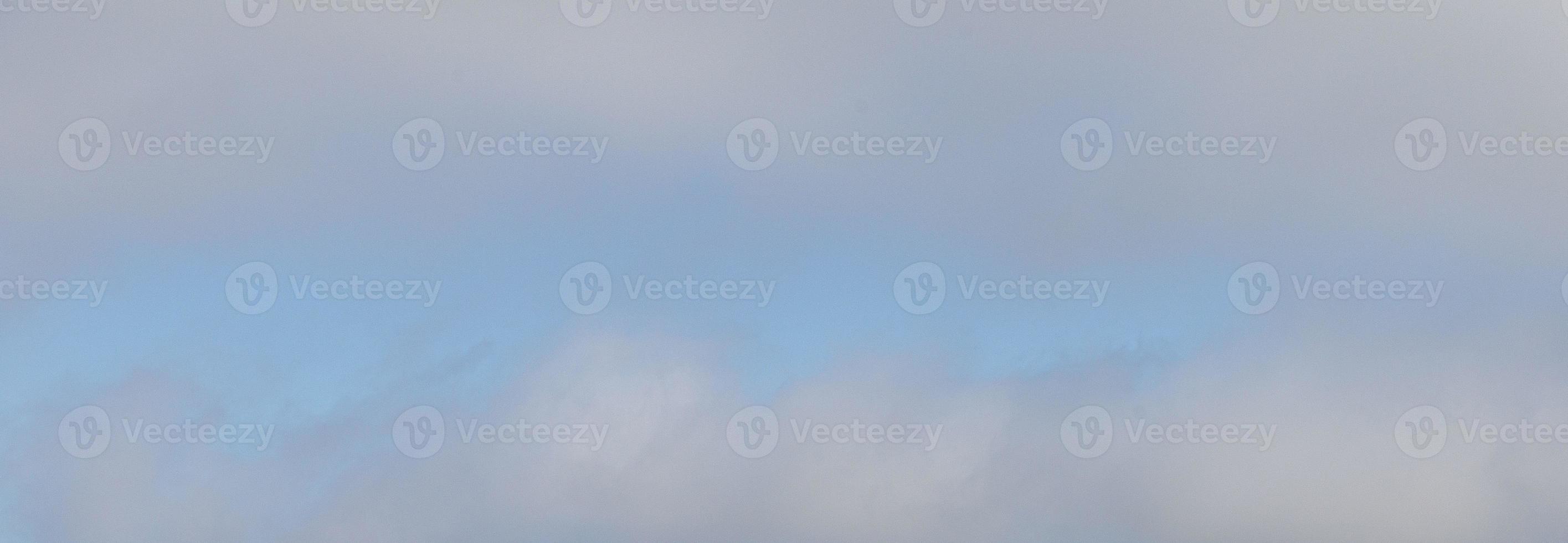 Image of a partly cloudy and partly clear sky during the day photo