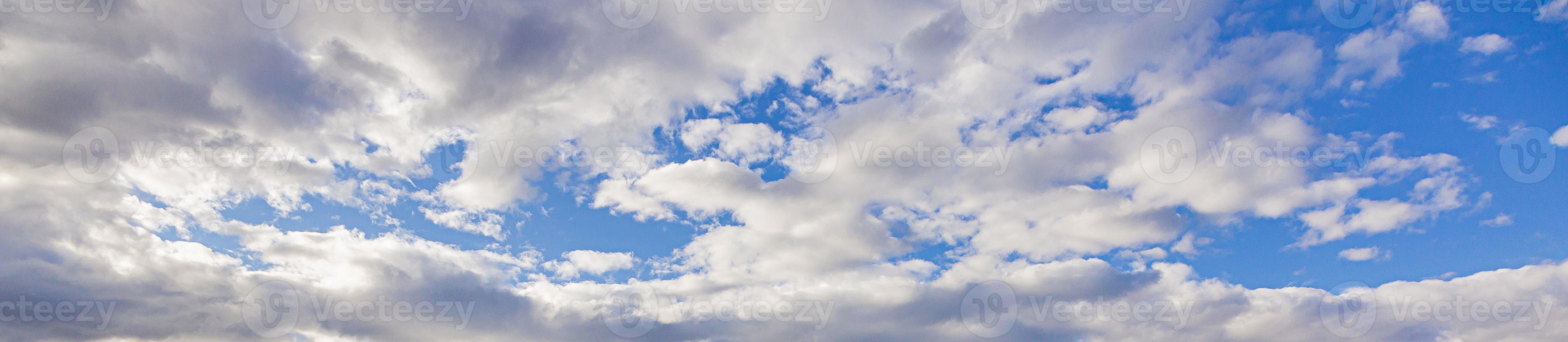 Image of a partly cloudy and partly clear sky during the day photo