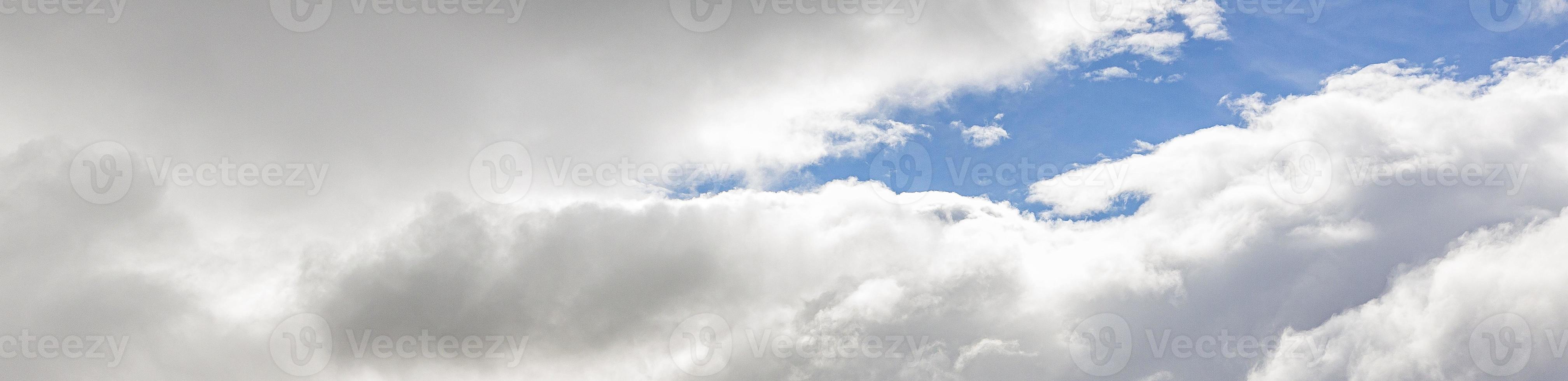 Image of a partly cloudy and partly clear sky during the day photo