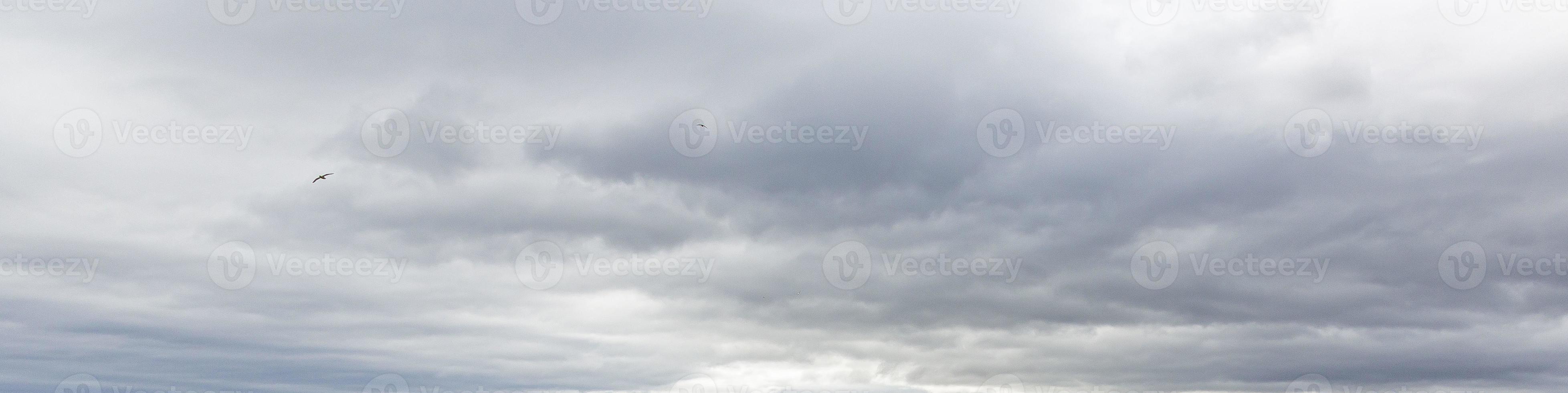 Image of a dark and cloudy sky during the day photo