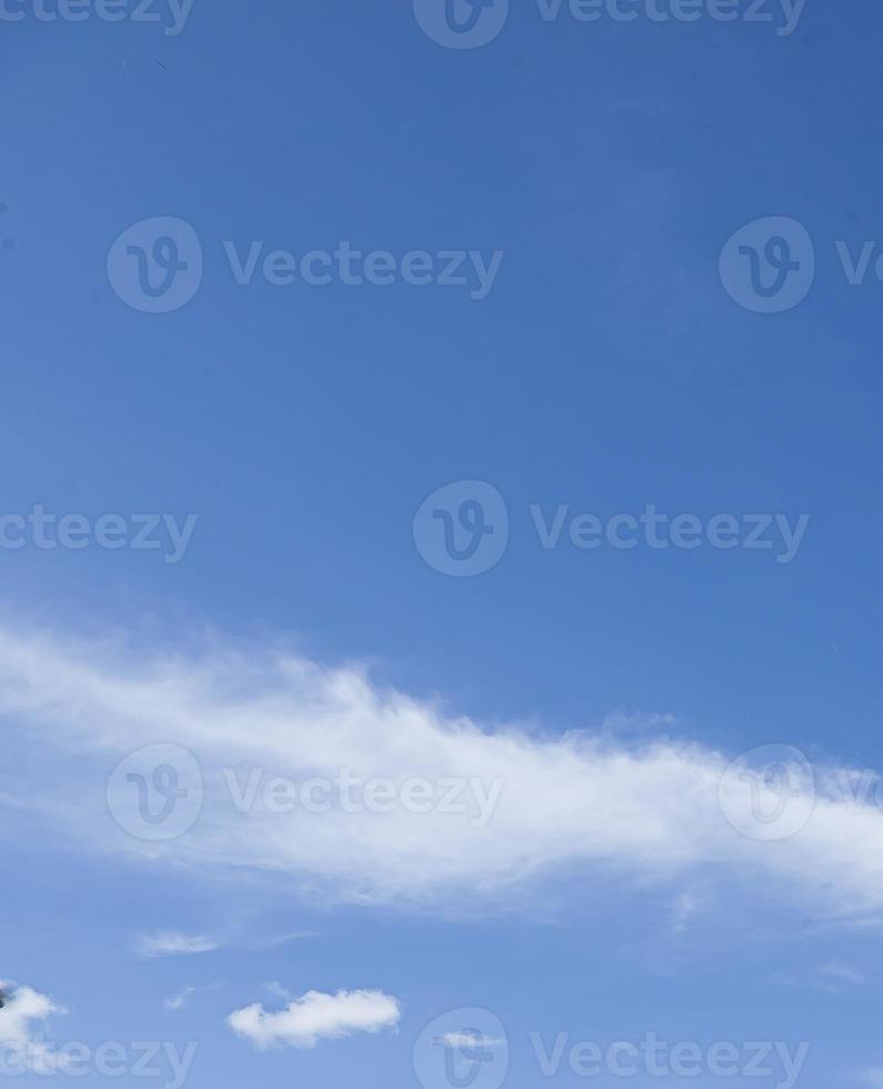 Image of a partly cloudy and partly clear sky during the day photo