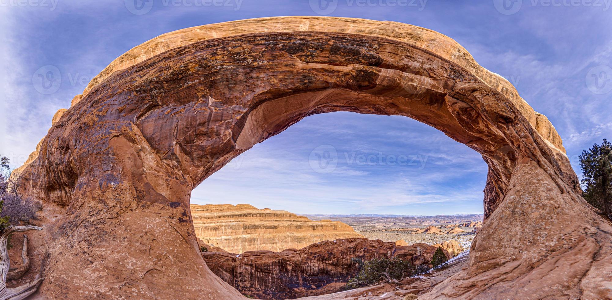 Panoramic picture of natural and geological wonders of Arches national park in Utah in winter photo