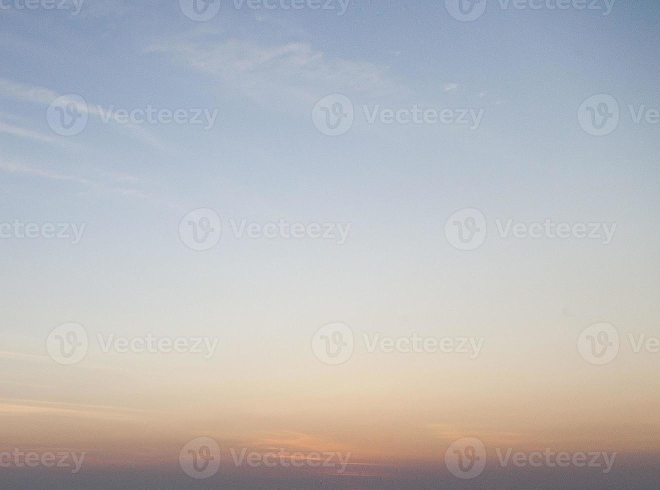 Dramatic colorful sky with afterglow and illuminated clouds photo