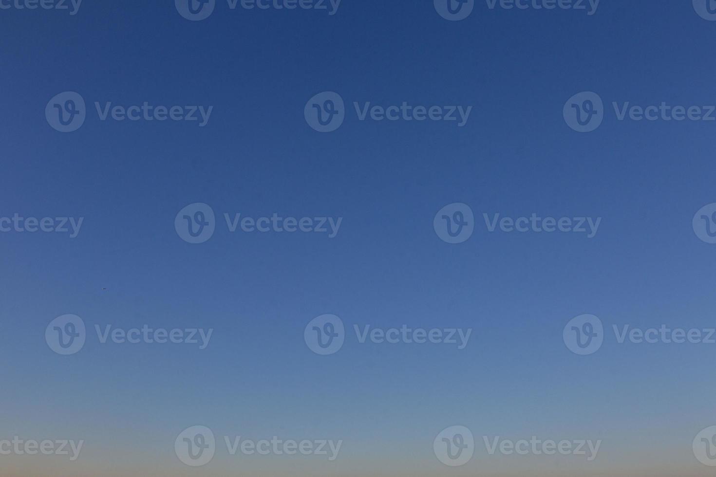 Image of a clear and cloudless sky can be used as background photo