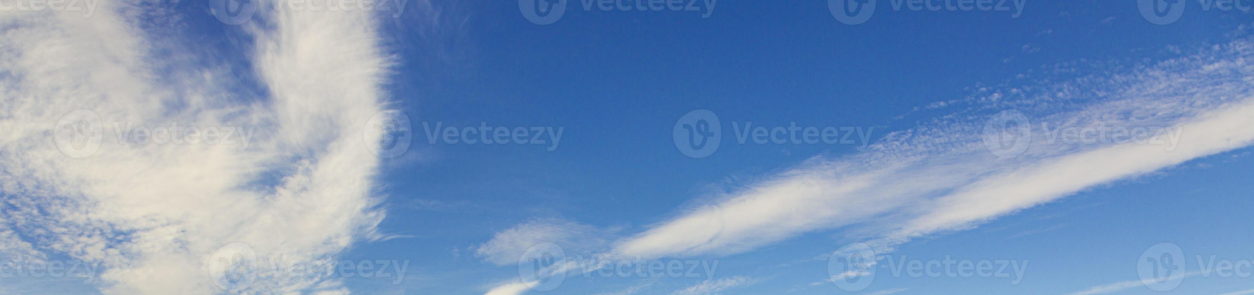 Image of a partly cloudy and partly clear sky during the day photo