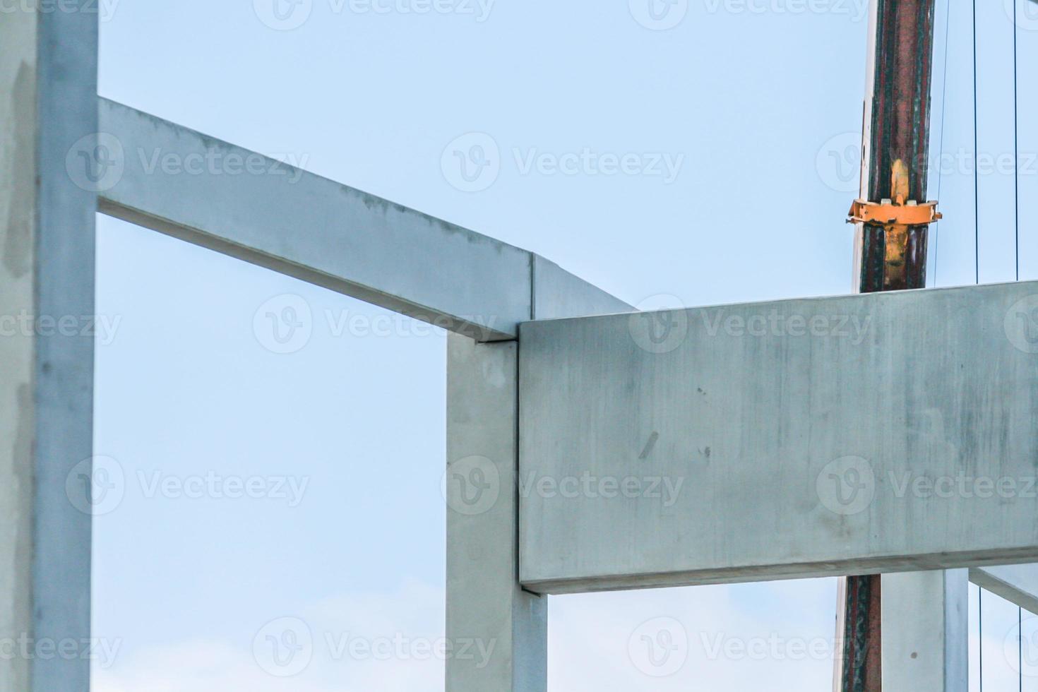 Precast concrete elements on construction site during installation process photo