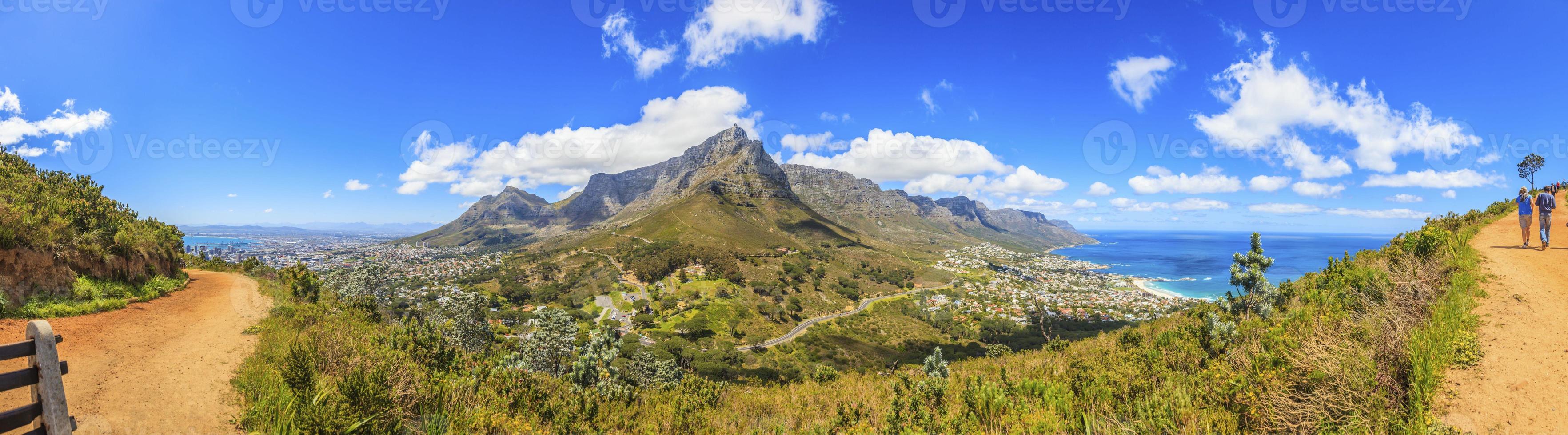 Panorama shot of Cape Town and Table Mountain climbing Lions Head photo