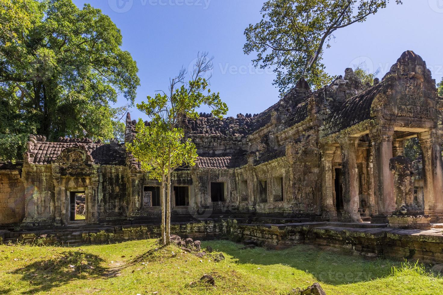 Mystical and famous ruins of Anchor Wat in Cambodia with no people in summer photo