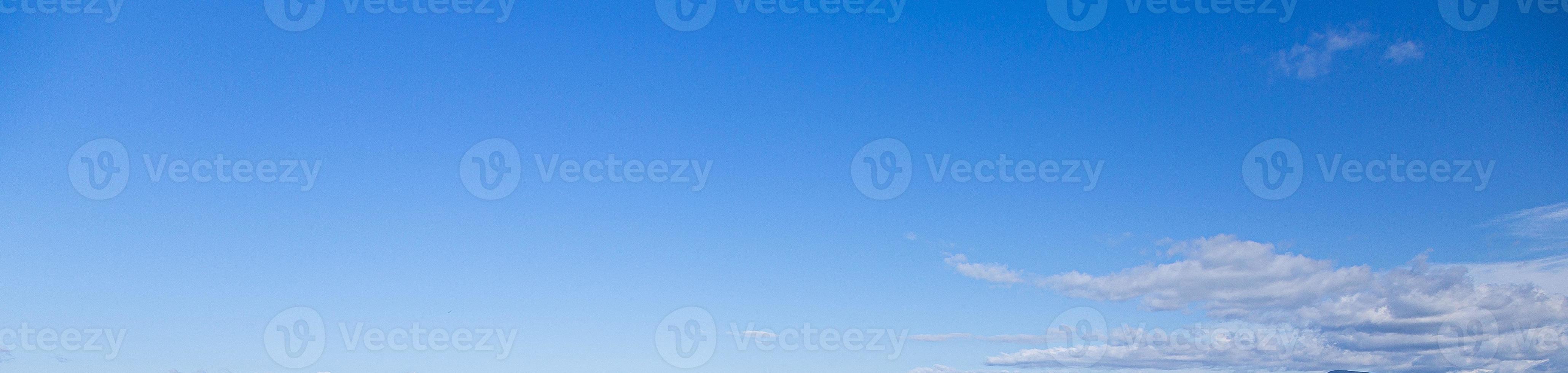 Image of a partly cloudy and partly clear sky during the day photo